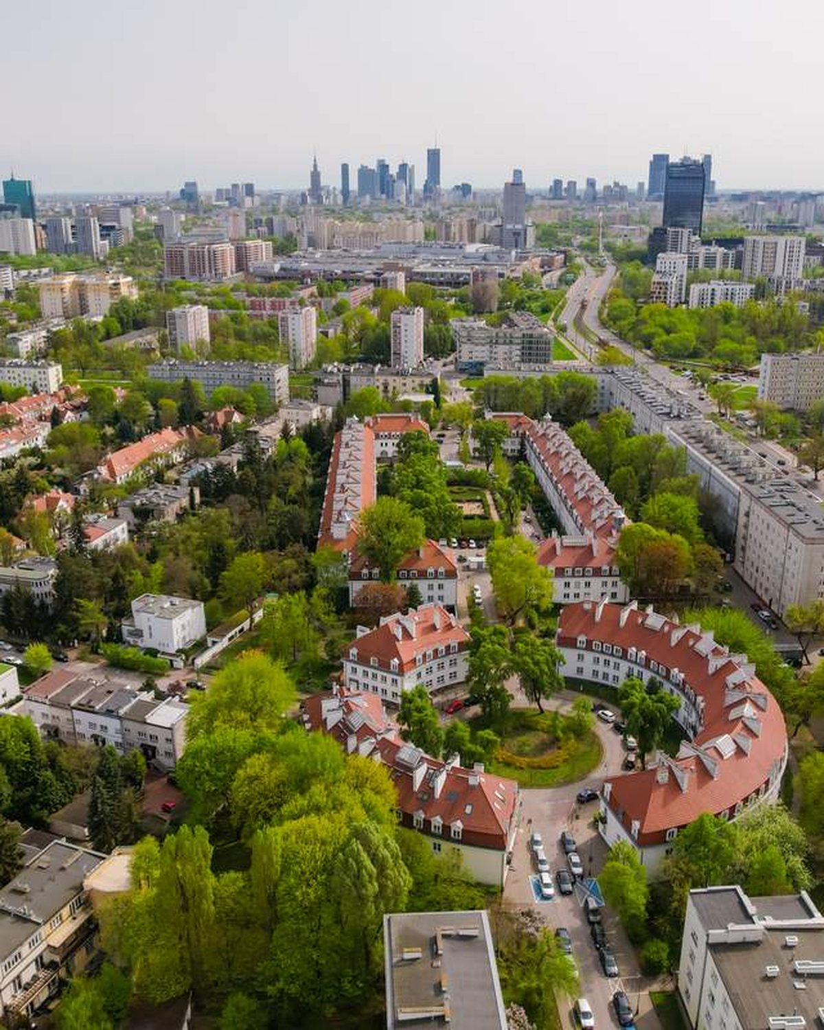 Aerial view of Zoliborz housing colonies with the Warsaw skyline behind